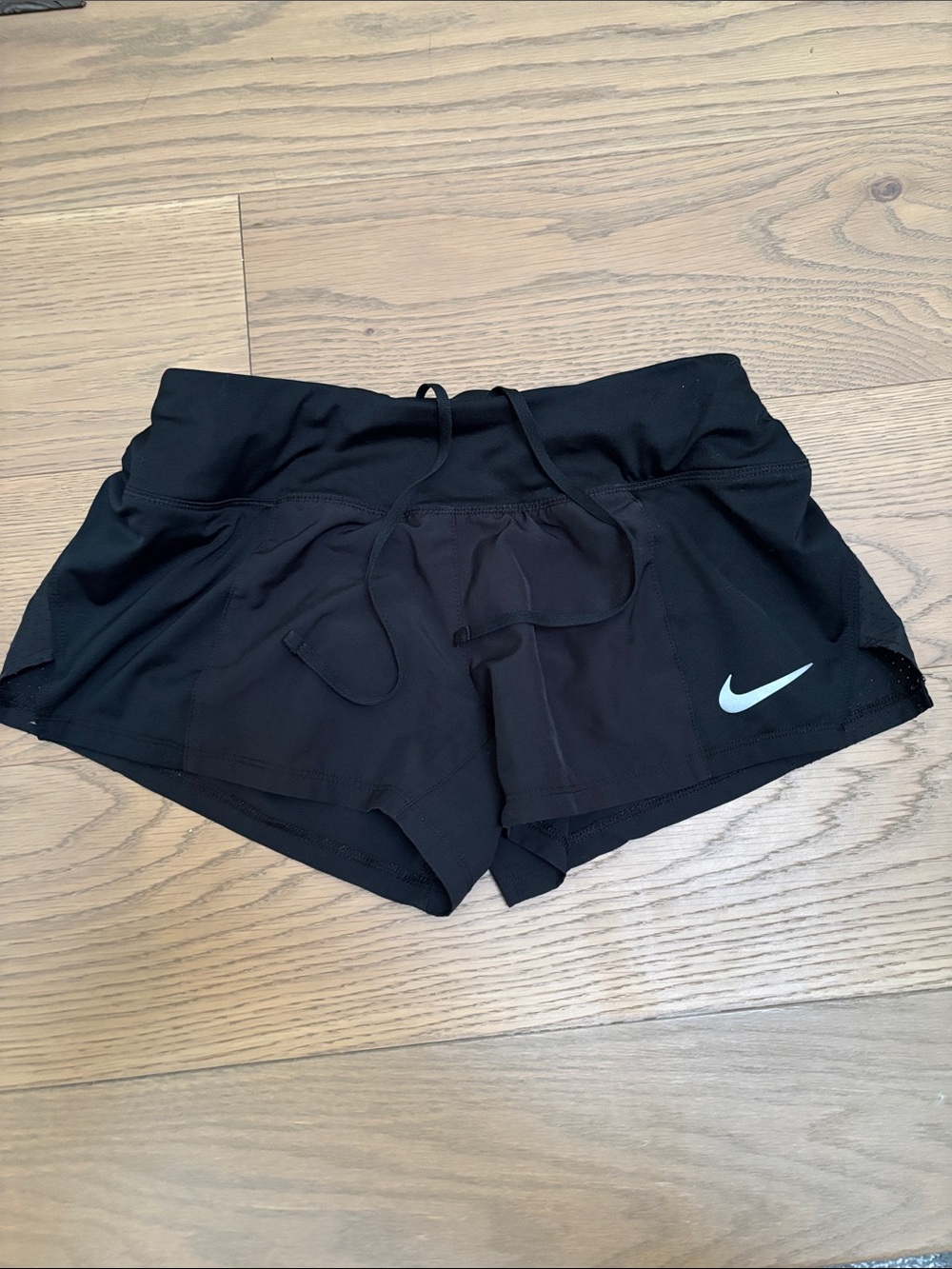 Nike Women’s Black Athletic Shorts with White Swoosh